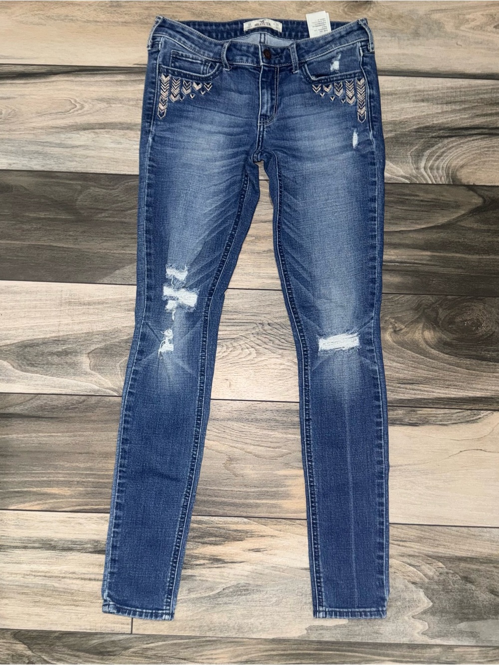 Hollister womenDark Blue Distressed Skinny Jeans with Embroidered Pockets 26x31